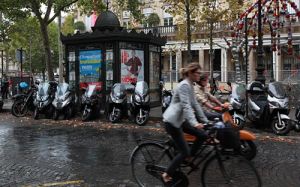 Paris Cyclists in the Rain 